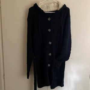 Women’s knit sweater with faux shearling hood
